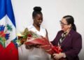 Raina Forbin receives the Haitian winner of the Eloquentia 2026 competition