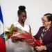 Raina Forbin receives the Haitian winner of the Eloquentia 2026 competition